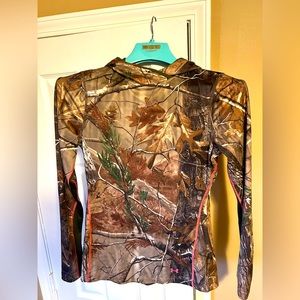 Women’s scent blocker tree spider bibs and UA hooded base layer.